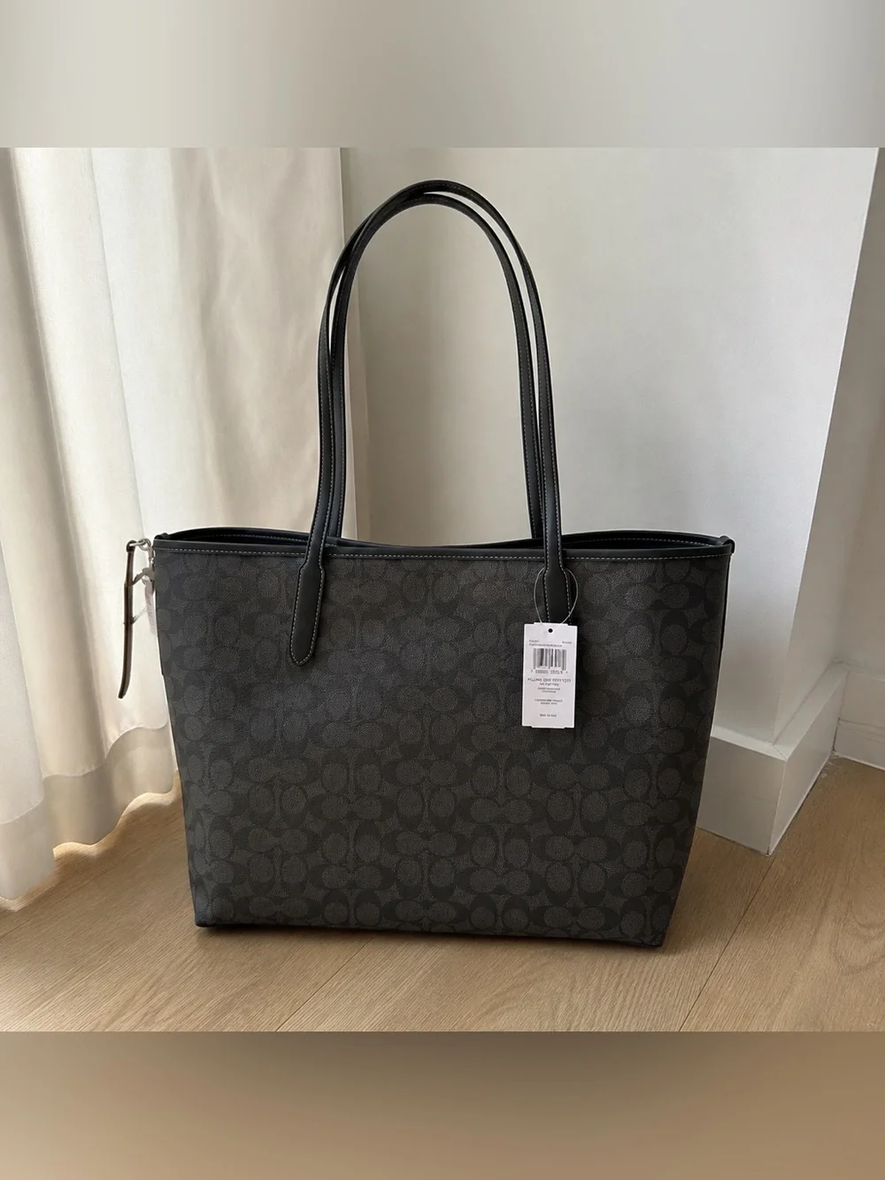 Coach black signature